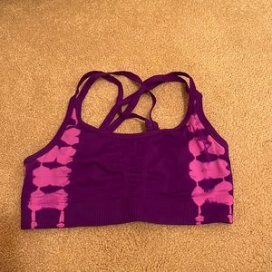 Pink and purple sports bra, size small.